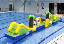 Ordene una carrera de obstáculos hinchable de 12 metros de largo en Hawaii con 2 toboganes para jóvenes y mayores. Comprar carreras de obstáculos hinchables online ahora en JB Hinchables España