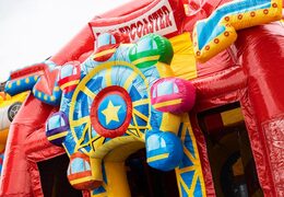 Solicite un colchón de aire multijuego inflable grande con tema de montaña rusa que incluye tobogán para niños