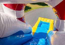 Cojín de aire inflable con sección de salto y tobogán temático de pato de goma a la venta para niños