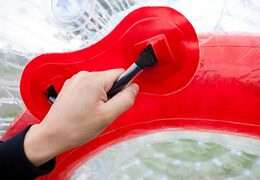 Mango en pelota inflable