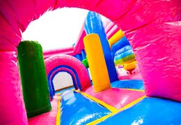 Interior del castillo hinchable Dubbelslide Multiplay azul amarillo rosa