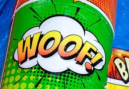 Castillo hinchable A-frame Super Comic con tema cómic, ideal para eventos y fiestas