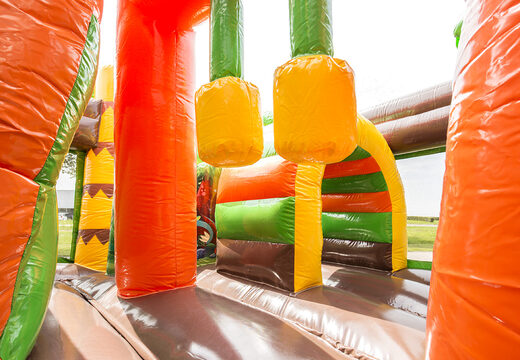 Ordene el castillo hinchable multijugador inflable mediano en tema dinoworld con tobogán para niños. Compre castillos hinchables en línea en JB Hinchables España