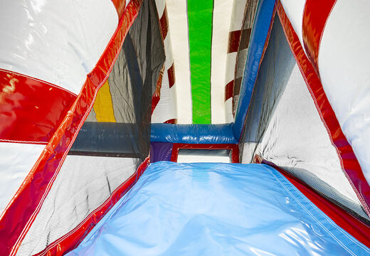 Compra el castillo hinchable multijugador L Candyworld con tobogán para niños. Ordene castillos hinchables en línea en JB Hinchables España