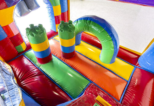 Compre castillo hinchable multijugador de interior con tobogán en tema Lego para niños. Ordene castillos hinchables en línea en JB Hinchables España