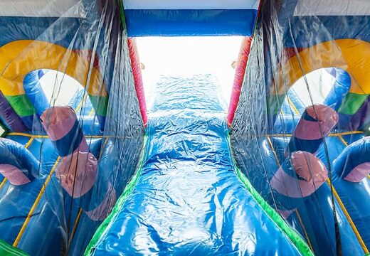 Un castillo hinchable con temática de unicornio con un tobogán y objetos en 3D para niños. Ordene castillos hinchables en línea en JB Hinchables España