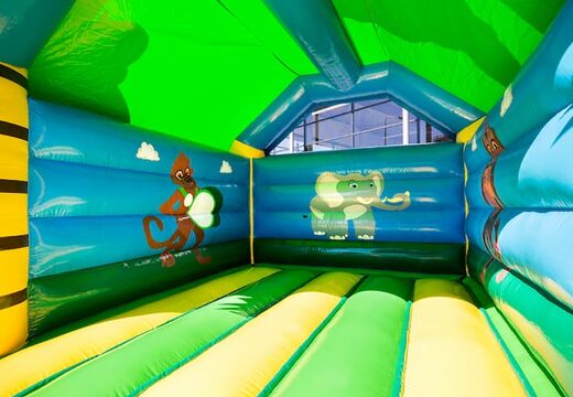 Compre un castillo hinchable de la jungla estándar en colores llamativos con un gran objeto de gorila en 3D en la parte superior para los niños. Compre hinchables en línea en JB Hinchables España