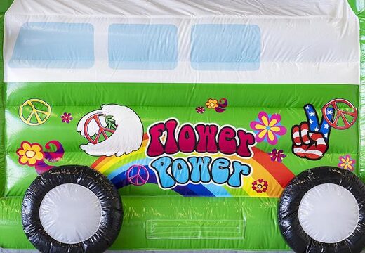 Pedir castillo hinchable estándar con techo en tema hippy verde para niños