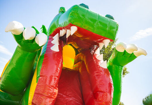 Cojín de aire hinchable multiplay con tobogán en tema dino verde amarillo a la venta