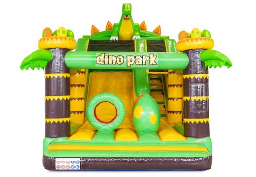 Castillo hinchable con obstáculos y tobogán en el tema Dino Park