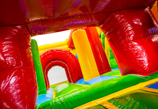 Interior del castillo inflable Dubbelslide Multiplay Verde rojo amarillo